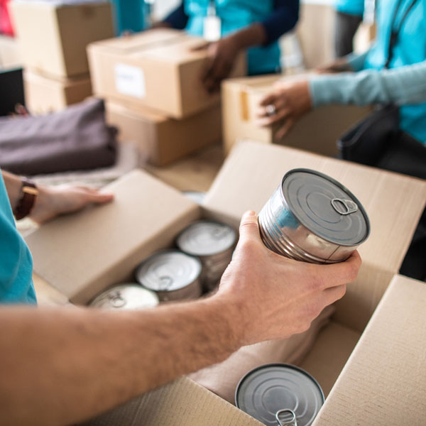 volunteers packing food